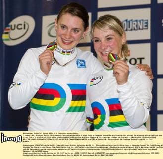(120404) -- MELBOURNE, April 4, 2012 (Xinhua) -- Miriam Welte (L) and Kristina Vogel of Germany present the gold medals after winning the women s team sprint final race on day 1 of 2012 UCI Track Cycling World Championships in Melbourne, Australia on April 4, 2012. Germany claimed the title with 32.549 seconds. (Xinhua Bai Xue) AUSTRALIA-MELBOURNE-UCI TRACK CYCLING WORLD CHAMPIONSHIPS 
