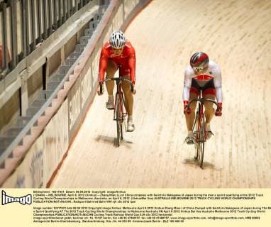 (120406) -- MELBOURNE, April 6, 2012 (Xinhua) -- Zhang Miao (L) of China competes with Seiichiro Nakagawa of Japan during the men s sprint qualifying at the 2012 Track Cycling World Championships in Melbourne, Australia, on April 6, 2012. (Xinhua Bai Xue) AUSTRALIA-MELBOURNE-2012 TRACK CYCLING WORLD CHAMPIONSHIPS 