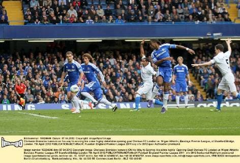 Chelseas Branislav Ivanovic on his way to scoring his sides highly debatable opening goal Chelsea FC London vs. Wigan Athletic, Barclays Premier League, at Stamford Bridge, London. 7th April 2012 EDITORIAL USE ONLY. No use with unauthorised audio, video, data, fixture lists, club league logos or live services. Online in-match use limited to 120 images, no video emulation. No use in betting, games or single club league player publications.