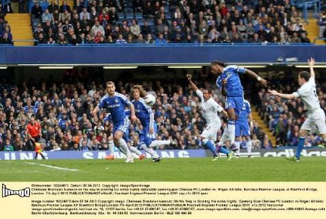 Chelseas Branislav Ivanovic on his way to scoring his sides highly debatable opening goal Chelsea FC London vs. Wigan Athletic, Barclays Premier League, at Stamford Bridge, London. 7th April 2012 EDITORIAL USE ONLY. No use with unauthorised audio, video, data, fixture lists, club league logos or live services. Online in-match use limited to 120 images, no video emulation. No use in betting, games or single club league player publications.