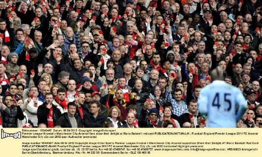 Premier League Arsenal v Manchester City Arsenal fans show their delight at Mario Balotelli red card 