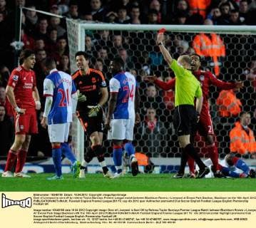 Doni of Liverpool is sent off by referee Taylor.Barclays Premier League match between Blackburn Rovers v Liverpool at Ewood Park Stadium, Blackburn on the 10th April 2012. . EDITORIAL USE ONLY. No use with unauthorised audio, video, data, fixture lists, club league logos or live services. Online in-match use limited to 120 images, no video emulation. No use in betting, games or single club league player publications.