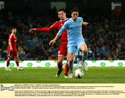 Football - Premier League - Manchester City vs. West Bromwich Albion West Brom s Graham Dorrans and Samir Nasri of Manchester City at the Etihad Stadium 