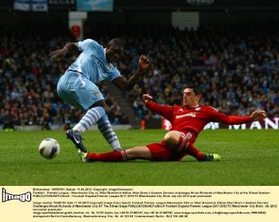 Football - Premier League - Manchester City vs. West Bromwich Albion West Brom s Graham Dorrans challenges Micah Richards of Manchester City at the Etihad Stadium 