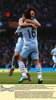 Football - Premier League - Manchester City vs. West Bromwich Albion David Silva of Manchester City celebrates with opening goal scorer Sergio Aguero at the Etihad Stadium 