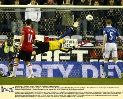 Football -Premier League- Wigan Athletic vs. Manchester United- Man Utd keeper David De Gea is beaten by Wigan s Shaun Maloney for the first goal at The DW Stadium 