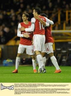 Football - Premier League - Wolverhampton Wanderers vs. Arsenal Arsenal s Yossi Benayoun celebrates scoring their third goal at Molineux Stadium, Wolverhampton 