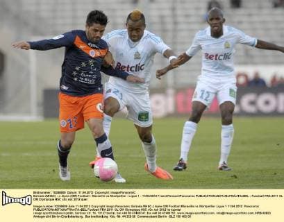 Estrada (MHSC) - J. Ayew (OM) Football : Marseille vs Montpellier - Ligue 1 - 11 04 2012 FranckPennant Panoramic 