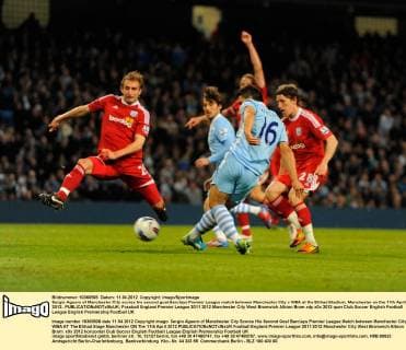 Sergio Aguero of Manchester City scores his second goal.Barclays Premier League match between Manchester City v WBA at the Etihad Stadium, Manchester on the 11th April 2012.. EDITORIAL USE ONLY. No use with unauthorised audio, video, data, fixture lists, club league logos or live services. Online in-match use limited to 120 images, no video emulation. No use in betting, games or single club league player publications.