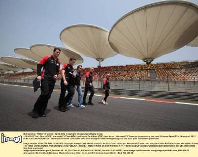 12.04.2012 Timo Glock (GER) Marussia F1 Team MR01 and Maria De Villota (ESP), test driver, Marussia F1 Team are examinating the track Chinese Grand Prix, Shanghai 2012 