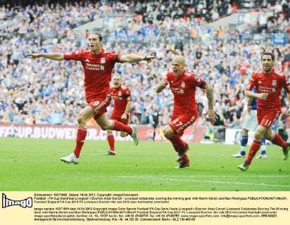 Football - FA Cup Semifinal Liverpool v Everton Andy Carroll - Liverpool celebrates scoring the winning goal with Martin Skrtel and Maxi Rodriguez 