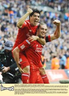 Football - FA Cup Semifinal Liverpool v Everton Andy Carroll - Liverpool celebrates scoring the winning goal with team mate, Luis Suarez 