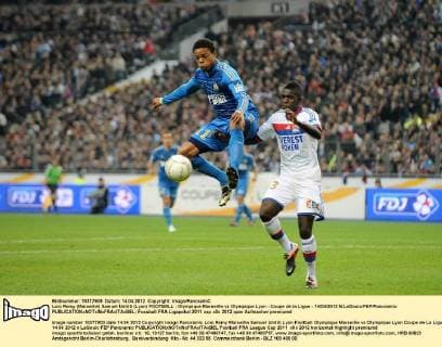 Loic Remy (Marseille) Samuel Umtiti (Lyon) FOOTBALL : Olympique Marseille vs Olympique Lyon - Coupe de la Ligue - 14 04 2012 N.LeGouic FEP Panoramic 