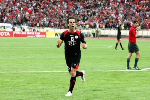 Ali Karimi of Iran s Persepolis celebrates after his goal during the AFC Champions League match against Qatar s Al-Gharafa at Azadi stadium in Tehran, Iran, April 17, 2012. The match ended with a 1-1 tie. (Xinhua Ahmad Halabisaz) (jyc) IRAN-TEHRAN-SOCCER-AFC CHAMPIONS LEAGUE 