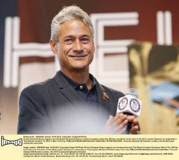 Diving Olympiad Greg Louganis are introduced during the Road to London ceremony where the 100-day countdown to the start of the 2012 London Olympics is celebrated in Time Square on April 18, 2012 in New York City.  NYP20120418303