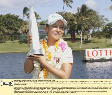 April 21, 2012: Ai Miyazato celebrates with the championship trophy after her 12 under par victory at LPGA Golf Damen LOTTE Championship at Ko Olina Golf Club in Kapolei, Hawai i LPGA Golf Damen 2012: LOTTE Championship APR 21 - ZUMAct5