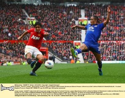 Football - Premier League - Manchester United vs. Everton Rafael of Manchester United and Steven Pienaar of Everton at Old Trafford 