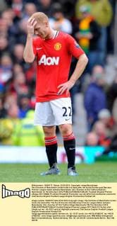 Paul Scholes of Manchester United holds his head after the fourth Everton goal.Barclays Premier League match between Manchester Utd v Everton at Old Trafford Stadium, Manchester on the 22nd April 2012 EDITORIAL USE ONLY. No use with unauthorised audio, video, data, fixture lists, club league logos or live services. Online in-match use limited to 120 images, no video emulation. No use in betting, games or single club league player publications.
