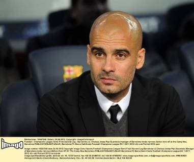Football - Champions League Semi-Final Second Leg - Barcelona vs. Chelsea Josep Pep Guardiola manager of Barcelona looks nervous before kick off at the Camp Nou, Barcelona 