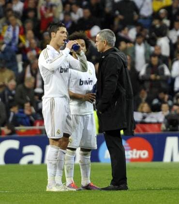 Real Madrid - FC Bayern Munich - UEFA Champions League 2011-2012 - Semifinal - Second Leg - Estadio Santiago Bernabeu - Madrid - Spain - 25 04 2012 Jose Mourinho, coach and manager of Real Madrid C.F. and Cristiano Ronaldo talking before penalties 