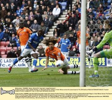 Football -Premier League- Wigan Athletic vs. Newcastle United - Wigan s Victor Moses scores the second goal at The DW Stadium 