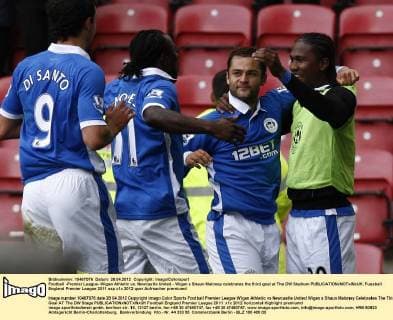 Football -Premier League- Wigan Athletic vs. Newcastle United - Wigan s Shaun Maloney celebrates the third goal at The DW Stadium 