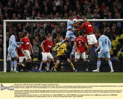 Football -Premier League- Manchester City vs. Manchester United - Man City s Vincent Kompany scores the first goal at The Etihad Stadium 