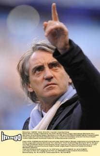 Roberto Mancini manager of Manchester City points .Barclays Premier League match between Manchester City v Manchester Utd at the Etihad Stadium, Manchester on the 30th April 2012 EDITORIAL USE ONLY. No use with unauthorised audio, video, data, fixture lists, club league logos or live services. Online in-match use limited to 120 images, no video emulation. No use in betting, games or single club league player publications.