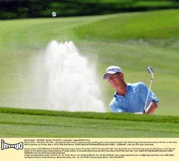 May 4, 2012 - Charlotte, NC, USA - John Senden hits out of a sand trap onto the 5th green in the second round of the Wells Fargo Championship at Quail Hollow in Charlotte, North Carolina, on Friday, May 4, 2012. PGA Golf Herren TOUR - ZUMAm67