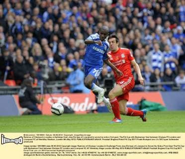 Ramires of Chelsea (L) evades a challenge from Jose Enrique of Liverpool to score his side s first goal..The FA Cup with Budweiser final between Chelsea FC London and Liverpool FC at Wembley Stadium, London 5th May 2012. EDITORIAL USE ONLY. No use with unauthorised audio, video, data, fixture lists, club league logos or live services. Online in-match use limited to 120 images, no video emulation. No use in betting, games or single club league player publications.