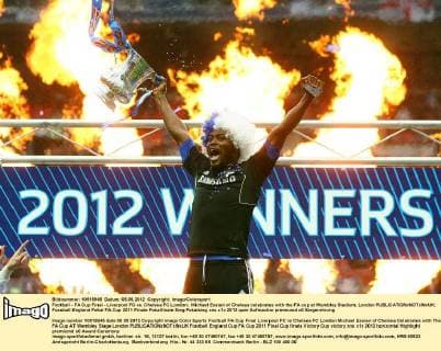 Football - FA Cup Final - Liverpool FC vs. Chelsea FC London; Michael Essien of Chelsea celebrates with the FA cup at Wembley Stadium, London 
