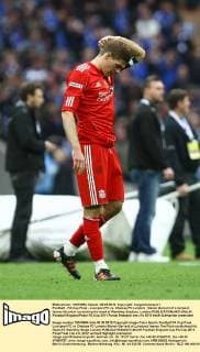 Football - FA Cup Final - Liverpool FC vs. Chelsea FC London; Steven Gerrard of Liverpool leaves the pitch scratching his head at Wembley Stadium, London 
