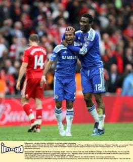 Chelseas Ashley Cole and John Obi Mikel celebrate at the final whistle..The FA Cup with Budweiser final between Chelsea FC London and Liverpool FC at Wembley Stadium, London 5th May 2012. EDITORIAL USE ONLY. No use with unauthorised audio, video, data, fixture lists, club league logos or live services. Online in-match use limited to 120 images, no video emulation. No use in betting, games or single club league player publications.