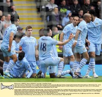 Yaya Toure (2nd L) of Manchester City is mobbed after scoring his side s first goal- Barclays Premier League match between Newcastle United vs. Manchester City - at the Sports Direct Stadium, Newcastle on the 6th May 2012. xPicRichard LeexEDITORIAL USE ONLY. No use with unauthorised audio, video, data, fixture lists, club league logos or live services. Online in-match use limited to 120 images, no video emulation. No use in betting, games or single club league player publications.