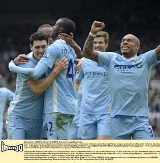 Yaya Toure of Manchester City (2nd L) celebrates scoring his side s second goal with team mates- Barclays Premier League match between Newcastle United vs. Manchester City - at the Sports Direct Stadium, Newcastle on the 6th May 2012. xPicRichard LeexEDITORIAL USE ONLY. No use with unauthorised audio, video, data, fixture lists, club league logos or live services. Online in-match use limited to 120 images, no video emulation. No use in betting, games or single club league player publications.
