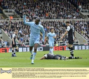 Yaya Toure of Manchester City (L) scores his side s second goal..Barclays Premier League match between Newcastle Utd v Manchester City at the Sports Direct Stadium, Newcastle on the 6th May 2012. . EDITORIAL USE ONLY. No use with unauthorised audio, video, data, fixture lists, club league logos or live services. Online in-match use limited to 120 images, no video emulation. No use in betting, games or single club league player publications.