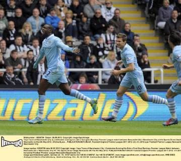 Yaya Toure of Manchester City (L) celebrates scoring his side s first goal..Barclays Premier League match between Newcastle Utd v Manchester City at the Sports Direct Stadium, Newcastle on the 6th May 2012. xRichardLeex... EDITORIAL USE ONLY. No use with unauthorised audio, video, data, fixture lists, club league logos or live services. Online in-match use limited to 120 images, no video emulation. No use in betting, games or single club league player publications.
