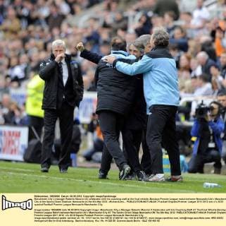 Manchester City s manager Roberto Mancini (C) celebrates with his coaching staff at the final whistle..Barclays Premier League match between Newcastle Utd v Manchester City at the Sports Direct Stadium, Newcastle on the 6th May 2012. xRichardLeex... EDITORIAL USE ONLY. No use with unauthorised audio, video, data, fixture lists, club league logos or live services. Online in-match use limited to 120 images, no video emulation. No use in betting, games or single club league player publications.