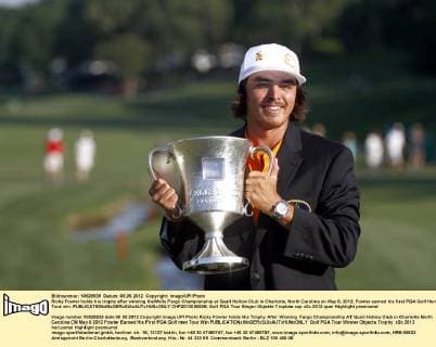 Ricky Fowler holds his trophy after winning theWells Fargo Championship at Quail Hollow Club in Charlotte, North Carolina on May 6, 2012. Fowler earned his first PGA Golf Herren Tour win.  CHP2012050695