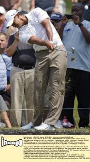 May 08, 2012 - Vedra Beach, Florida, U.S. - TIGER WOODS hits the ball on the 3rd tee during a practice round before the start of The Players Championship held at The Players Stadium course at TPC Sawgrass in Ponte Vedra Beach, Florida. Golf 2012 - THE PLAYERS Championship - Practice Round  - ZUMAr11