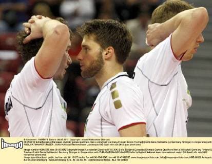 09.05.2012 Sofia(Bulgaria) European olympic games qualifiers men s volleyball Germany-Finland Simon Tischer(c) with Denis Kaliberda (L) Germany :Stringer in cooperation with 