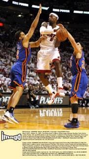 May 9, 2012 - Miami, FL, USA - The Miami Heat s LeBron James leaps between the New York Knicks Landry Fields, left, and Mike Bibby in the first quarter in Game 5 of the Eastern Conference first-round series at American Airlines Arena in Miami, Florida, on Wednesday, May 9, 2012. Game 5: New York Knicks at Miami Heat - ZUMAm67