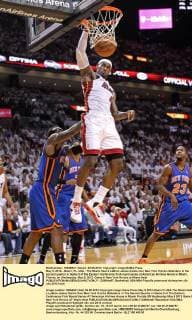May 9, 2012 - Miami, FL, USA - The Miami Heat s LeBron James dunks over New York Knicks defenders in the second quarter in Game 5 of the Eastern Conference first-round series at American Airlines Arena in Miami, Florida, on Wednesday, May 9, 2012. Game 5: New York Knicks at Miami Heat - ZUMAm67