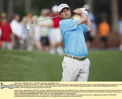 May 10, 2012 - Vedra Beach, Florida, U.S. - Golfer TIM CLARK takes his second shot from the fairway on the 10th hole during round 1 of THE PLAYERS Championship held at THE PLAYERS Stadium golf course at TPC Sawgrass in Ponte Vedra Beach, Florida. Golf 2012 - THE PLAYERS Championship Round 1  - ZUMAr11
