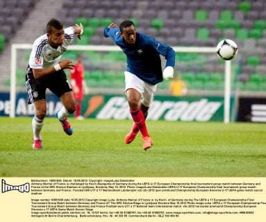 Anthony Martial of France is challanged by Kevin Akpoguma of Germany during the UEFA U-17 European Championship final tournament group match between Germany and France at the SRC Stozice Stadium in Ljubljana, Slovenia, May 10, 2012. Photo: imago Luka Dakskobler UEFA U-17 European Championship final tournament group match between Germany and France