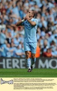 Football - Premier League - Manchester City vs. Queens Park Rangers Manchester City s Pablo Zabaleta celebrates scoring their opening goal at the Etihad Stadium, Manchester 