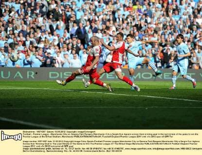 Football - Premier League - Manchester City vs. Queens Park Rangers Manchester City s Sergio Kun Agüero scores their winning goal in the last minute of the game to win the Premier League at the Etihad Stadium, Manchester 