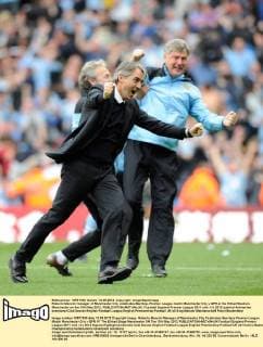 Roberto Mancini manager of Manchester City celebrates.Barclays Premier League match Manchester City v QPR at the Etihad Stadium, Manchester on the 13th May 2012. EDITORIAL USE ONLY. No use with unauthorised audio, video, data, fixture lists, club league logos or live services. Online in-match use limited to 120 images, no video emulation. No use in betting, games or single club league player publications.