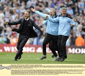 Roberto Mancini manager of Manchester City celebrates.Barclays Premier League match Manchester City v QPR at the Etihad Stadium, Manchester on the 13th May 2012. EDITORIAL USE ONLY. No use with unauthorised audio, video, data, fixture lists, club league logos or live services. Online in-match use limited to 120 images, no video emulation. No use in betting, games or single club league player publications.