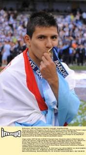 Sergio Kun Agüero of Manchester City with his 2012 Premier League medal.Barclays Premier League match Manchester City v QPR at the Etihad Stadium, Manchester on the 13th May 2012. EDITORIAL USE ONLY. No use with unauthorised audio, video, data, fixture lists, club league logos or live services. Online in-match use limited to 120 images, no video emulation. No use in betting, games or single club league player publications.